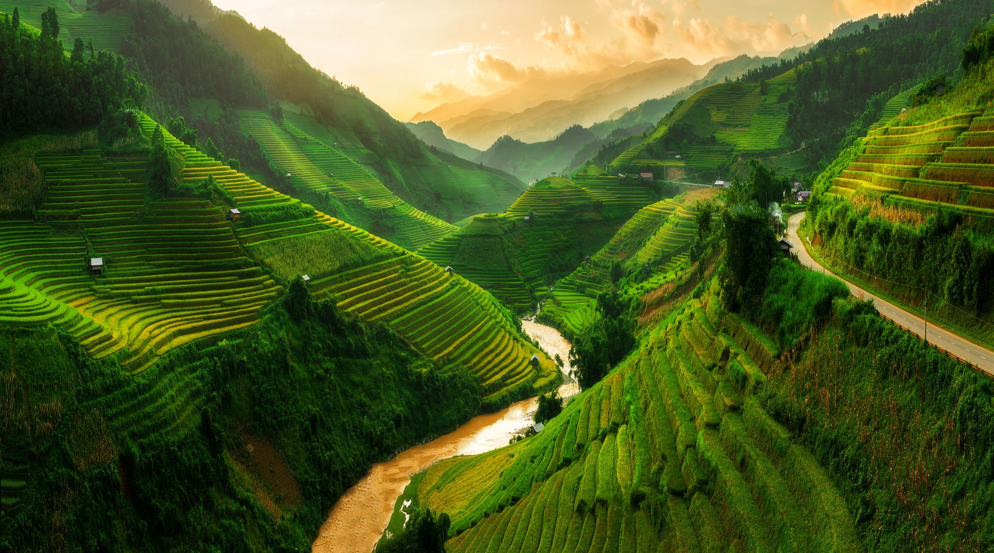 Terraced rice field landscape near Sapa in Vietnam. Mu Cang Chai Rice Terrace Fields stretching across the mountainside, layer by layer reaching up as endless, with about 2,200 hectares of rice terraces, of which 500 hectares of terraces of 3 communes such as La Pan Tan, Che Cu Nha and Ze Xu Phinh.